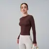 Roupas de Fitness Redondas de Alta Elasticidade Europeias e Americanas para Mulheres Cor Pura Camiseta Básica de Yoga Manga Longa Nylon de Moagem Curta Aparência Emagrecedora Tops Esportivos