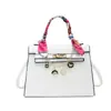 Bolso de mujer de nicho de alta gama 2026 nuevo de primavera vintage versátil bandolera bolso de mano versátil casual bolso tipo Kelly