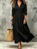 Vestido Chemise Vintage Plus Size Feminino com Mangas Longas, Gola Reversível, Cintura Abotoada, Barra Larga Pregueada, Caimento Solto Estilo Férias