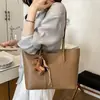 Bolso grande de capacidad simple para mujer, nuevo modelo de verano 2026, adecuado para el trabajo diario y los desplazamientos, bolso de hombro casual, bolso tote para mujer