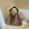 Bolso de hombro tipo tote de lona de color sólido minimalista estilo japonés, nueva moda 2026 de gran capacidad casual de alta apariencia