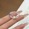 Anillo de Cristal Azul Transparente Perlado con Diseño Elegante para Verano, Banda Elástica Ajustable, Suave y Favorecedor, Anillo Versátil