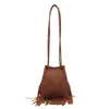2025 Nuevo Bolso de Hombro Pequeño con Borlas Moda Simple Ligero de Moda Bolso Cubo de Hombro Japonés y Coreano Cómodo Bolso Cruzado para Mujer