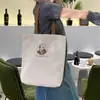 Bolsa de Lona para Mulheres 2025 Nova Estudante Grande Capacidade Bolsa de Mão Estilo Literário Preppy Bolsa Tiracolo Simples Bolsa de Ombro Estampada