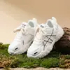 Zapatos Blancos para Niños Superficie de Cuero Impermeables Zapatos Deportivos para Niñas 2026 Primavera/Otoño Nuevos Versátiles Elegantes Antideslizantes Zapatos para Correr