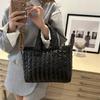 Bolso de Mano Rígido Estilo Perezoso para Viajes 2025 Primavera Nueva Moda Diseño de Nicho Gran Capacidad Bolso Tote Personalizado
