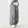 2026 Comercio Exterior Verano Hombres Secado Rápido Versátil Casual Pantalones Color Sólido Uso Diario Holgados Rectos Largos Pantalones Venta al por Mayor