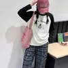 Camiseta de Manga Longa para Meninas Outono Inicial 2026 Novo Estilo Crianças Top Soltinho Estiloso Roupa de Primavera e Outono para Meninas Camisa Versátil de Base