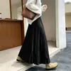 Elegante saia plissada de cintura alta estilo retrô para mulheres, novo estilo para o início do outono de 2026, saia plissada de corte A que afina a silhueta e é estilosa, com barra larga