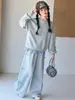 Conjunto deportivo estilo coreano para niñas, nuevo modelo otoño 2026 para niños mayores, conjunto de dos piezas con sudadera de imitación de dos piezas y pantalones de chándal con lazo