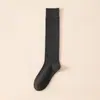 Calcetines de otoño e invierno para mujer hasta la pantorrilla, calcetines de hilo que no destiñen, negros y blancos, calcetines de compresión, al por mayor, estilo JK japonés, color liso, calcetines con volantes