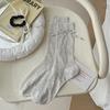 Versión coreana de calcetines miu bow calcetines de pierna jk de primavera y verano para mujer cien calcetines de rizo fino venta al por mayor transfronteriza