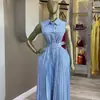 Ropa de Mujer Transfronteriza Europea y Americana Moda Nueva Verano 2026 Vestido Simple de Solapa sin Mangas con Corbata Plisado Rayado para Mujer