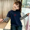 Camiseta Manga Longa Infantil 2026 Novo Estilo Infantil Primavera e Outono Estilo Desenho Coreano Roupa Camada Base Falso Duas Peças Algodão Puro T