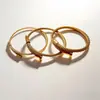 Aml Tendência Moda de Rua Estilo Europeu e Americano Pulseira Aberta Torcida para Unhas Femininas Fornecimento de Fábrica