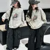 Sudadera para Niña 2026 Camiseta de Manga Larga Niños Medianos y Grandes Nuevo Top Rayado Infantil Elegante Cuello Redondo Capa Base Venta al por Mayor
