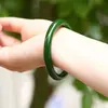 Fábrica directa 10 mm jade niña pintura de tinta vintage pulsera redonda jingle temperamento simple pulsera concubina imperial