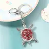 Llavero colgante de tortuga bestseller transfronterizo con diamantes, aleación de zinc, regalo pequeño creativo, decoración de mochila, llavero de coche