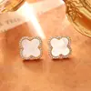 Aretes de Botón de Zirconia con Trébol de Cuatro Hojas de Nácar Natural Lujo Ligero Gama Alta Exquisitos Elegantes Pendientes de Temperamento Joyas de Oreja de Nicho para Socialité