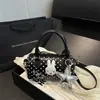Bolso cruzado y de mano versátil de lunares y estrella con orejas de conejo para mujer, versión coreana, bolso de hombro lindo y de moda nicho