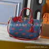 Bolsa Feminina Nova de Alta Qualidade Transfronteiriça de Guangzhou Bolsa de Cereja em Jeans Bolsa Transversal Almofada Bolsa Boston Almofada Azul Jeans