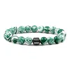 Europa y Estados Unidos transfronterizo más vendido piedra natural piedra volcánica piedra ojo de tigre pulsera de cuentas masculina imán pulsera magnética comercio exterior al por mayor