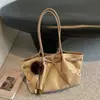 Bolso tote de acabado mate transfronterizo, bolso de hombro de gran capacidad para mujer, bolso de mano de alta gama, nicho, estilo vintage, y bolso de axila