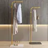 Perchero de hierro forjado, perchero simple de pie para uso doméstico en el dormitorio, tendedero para colgar ropa, estante de exhibición para tiendas de ropa