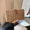 Bolsa de palha trançada nova transfronteiriça estilo coreano bolsa de mão para férias na praia bolsa de ombro bolsa transversal de palha trançada bolsa de praia da moda