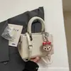 Bolsa de Mão de Luxo de Nicho de Alta Qualidade para Mulheres, Novo Modelo de Primavera 2026, Bolsa Quadrada Pequena Exquisita de Ombro e Transversal para Saídas