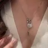 Collar de cadena para clavícula de lujo ligero de segunda mano con corazón de circón, luna y borla para mujer, de alta gama, único y elegante