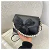Bolsa de Corrente com Pérolas Estilo Coreano 2026 Novo Modelo Tendência Moda Bolsa de Ombro Textura Casual Bolsa Transversal com Laço