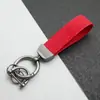 Colgante Llavero de Coche de Cuero Gamuzado Anillo de Resorte de Aleación de Zinc Cubierta de Llave Cadena de Llave con Logo de Coche Venta al por Mayor