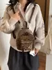 Mochila Mini de Moda Europea Transfronteriza Nueva Bolsa para Mujer de Comercio Exterior Estampado de Leopardo Flor Pequeña en la Espalda Bolsa de Viaje para Mujer