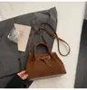 Bolsa de Mão de Design Exclusivo para Mulheres 2026 Novo Estilo Coreano Bolsa Saco Retrô de Camurça Elegante Bolsa de Ombro Transversal