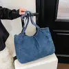 Bolso de Mezclilla Lavada Versátil Estilo Coreano para Mujer 2026 Nuevo Retro Casual de Hombro Único y de Mano de Gran Capacidad