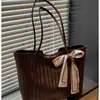 Bolso tote para mujer, nicho transfronterizo 2026 nuevo bolso tejido, bolso casual de gran capacidad para mujer, bolso de hombro estilo coreano