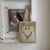 Bolsa de playa transfronteriza, bolsa de mano de viaje, bolso de hombro, bolsa tejida de paja, bolso cruzado tejido retro casual