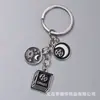 Llavero de aleación con forma de cabeza de gato, pata de gato, espina de pescado, transfronterizo, colgante creativo personalizado para bolsa, recuerdo para mascotas, Halloween