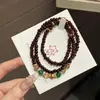 Pulsera de Tres Círculos Estilo Chino con Incrustaciones de Cristal Rojo Granada de Buena Suerte Temperamento Retro Trenzada Pulsera de Mejor Amiga