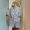 Roupas Femininas Transfronteiriças Europeias e Americanas Verão 2026 Novo Conjunto Casual com Camisa de Manga Curta Listrada de Lapela e Shorts de Perna Larga