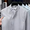 Camisa de Hombre 100% Algodón Puro Primavera y Otoño Nuevo Textil Oxford Lavado Rayas Verticales Top Casual Camisa de Manga Larga para Hombre