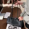Bolso tipo Baguette de Cuero Genuino Vintage para Mujer 2026 Nuevo Estilo Minimalista Piel de Vaca Capa Superior Bolso Boston Nicho Bolso de Hombro Único para Debajo del Brazo