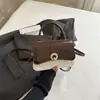 Nueva bolsa de hombro versátil para el día a día 2026, diseño cuadrado pequeño, bolsa cruzada de alta calidad, estilo casual color block y bolsa de mano para el trabajo