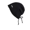 Gorro de tricô com borda enrolada, quente e à prova de vento, protege as orelhas, estilo novo, cor sólida com pequena decoração de logo, chapéu de tricô casual estiloso e versátil