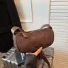 Bolso de mano de alta gama transfronterizo, nueva colección otoño/invierno 2026, diseño retro y minimalista, bolso de hombro pequeño y único, bolso cruzado de gamuza