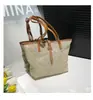 Bolsa feminina de palha, estilo sacola, com grande capacidade, ideal para as férias de verão de 2025, para estudantes e trabalho.