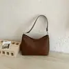 Bolso de Axila para Mujer 2026 Nuevo de Moda Verano Ligero Lujo Nicho Textura Tejida Bolso de Hombro Único Viaje Diario Bolso Cruzado Tipo Cubo