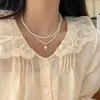 Colar de Pérolas Nicho de Luxo Leve High-End para Mulheres Ins Moda Tendência Versátil Elegante Aço Titânio Corrente Clavicular Colar Popular