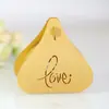 Fábrica de origen transfronterizo Caja de dulces hueca con láser estilo europeo para boda y Día de San Valentín Cartón dorado LOVE en stock